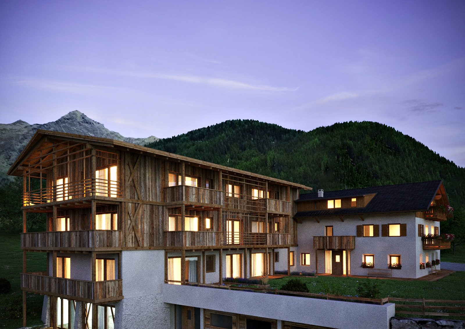 Chalet Schmied am Abend mit beleuchteten Fenstern